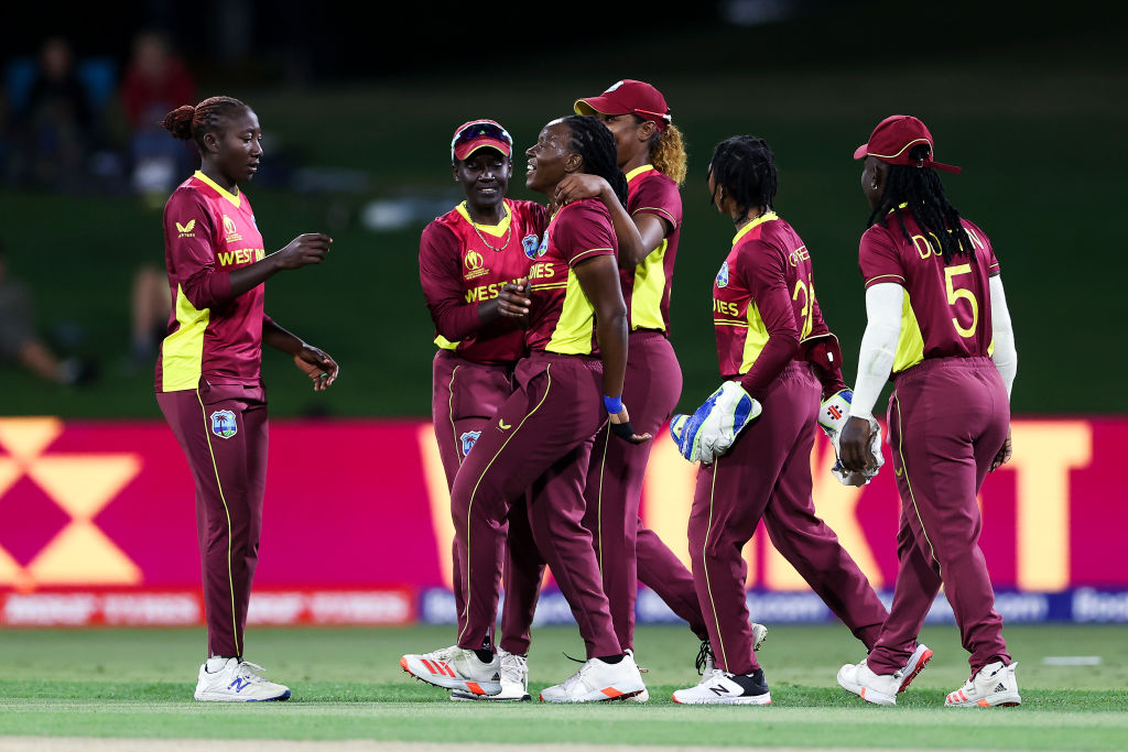 West Indies players celebrate the wicket of New Zealand's Maddie Green. Photo by Phil Walter-ICC...