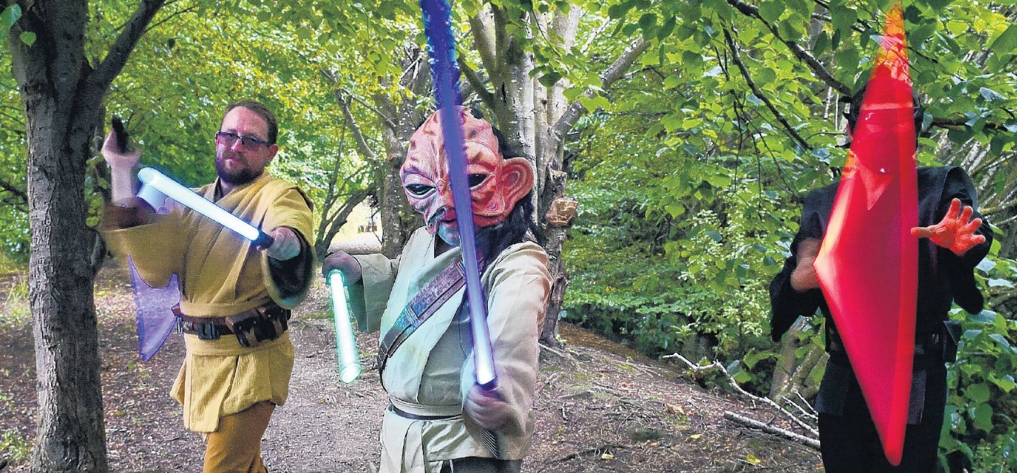 Dunedin Chapter of the New Zealand Lightsaber Guild members Cameron Lindsay (left), Warren...