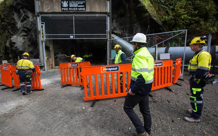 The agency mining team puts a barrier 5m in front of the mine portal. Photo: Pike River Recovery...