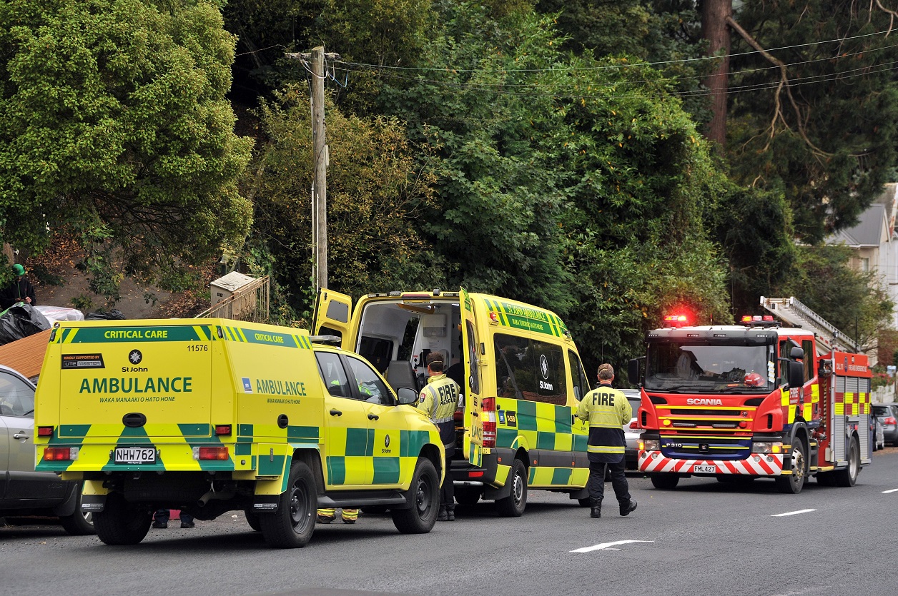 Emergency services at the scene after a student fell and injured himself in Dunedin yesterday....