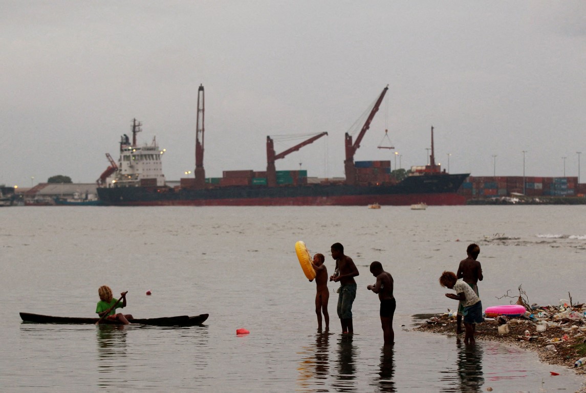 Children fish at a beach in central Honiara, the capital of the Solomon Islands. File photo: Reuters