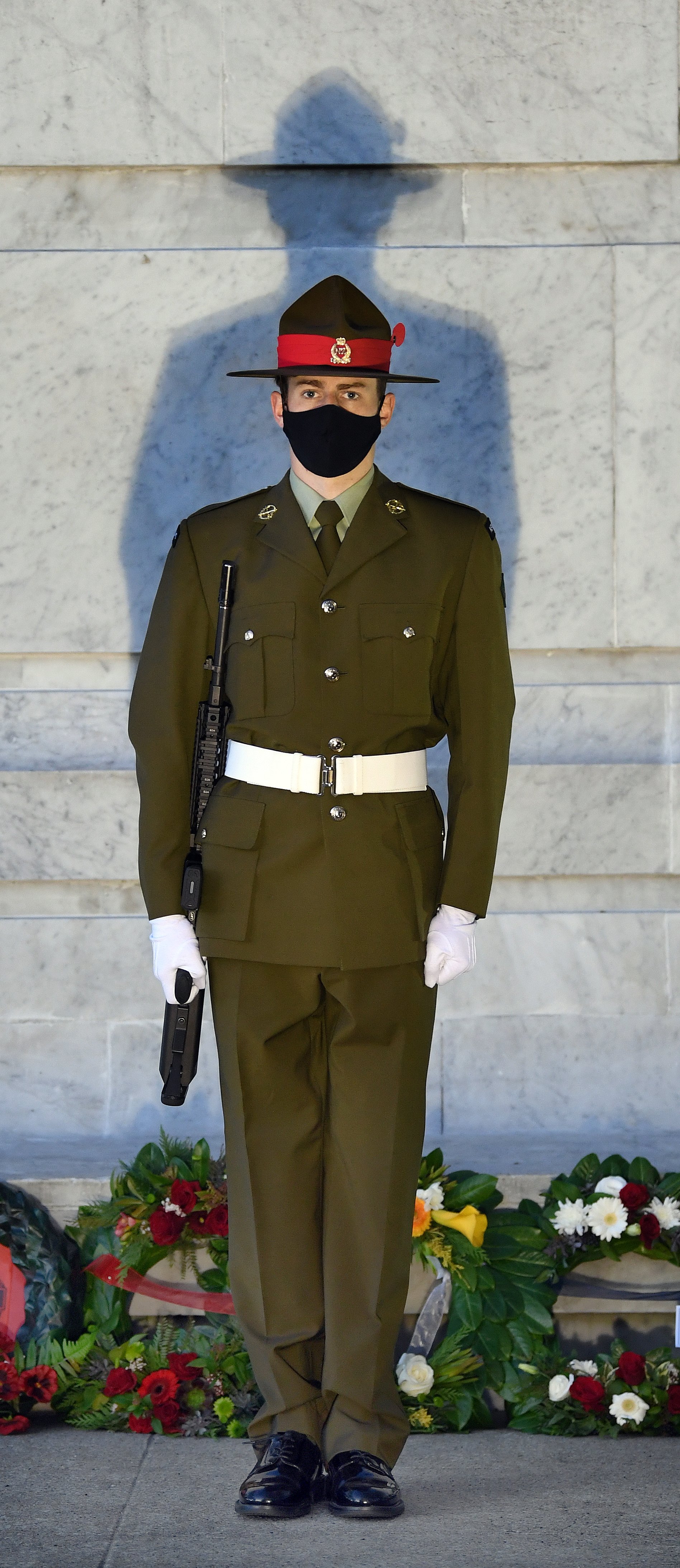 Standing guard at the Dunedin Anzac Day dawn service in Queens Gardens is Private Quinn Jackson,...