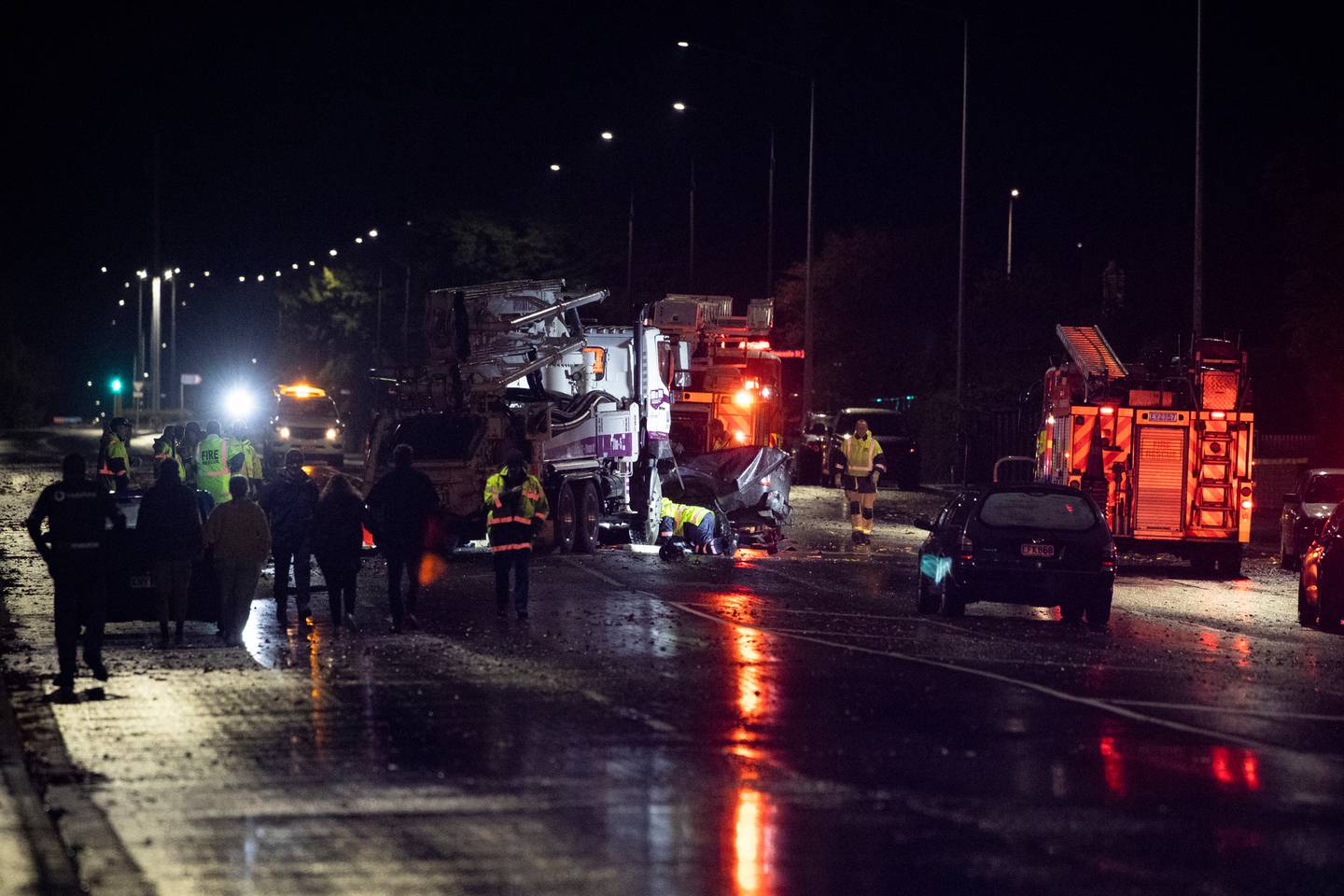 Emergency services at the scene of Friday's fatal crash in Invercargill. Photo: George Heard