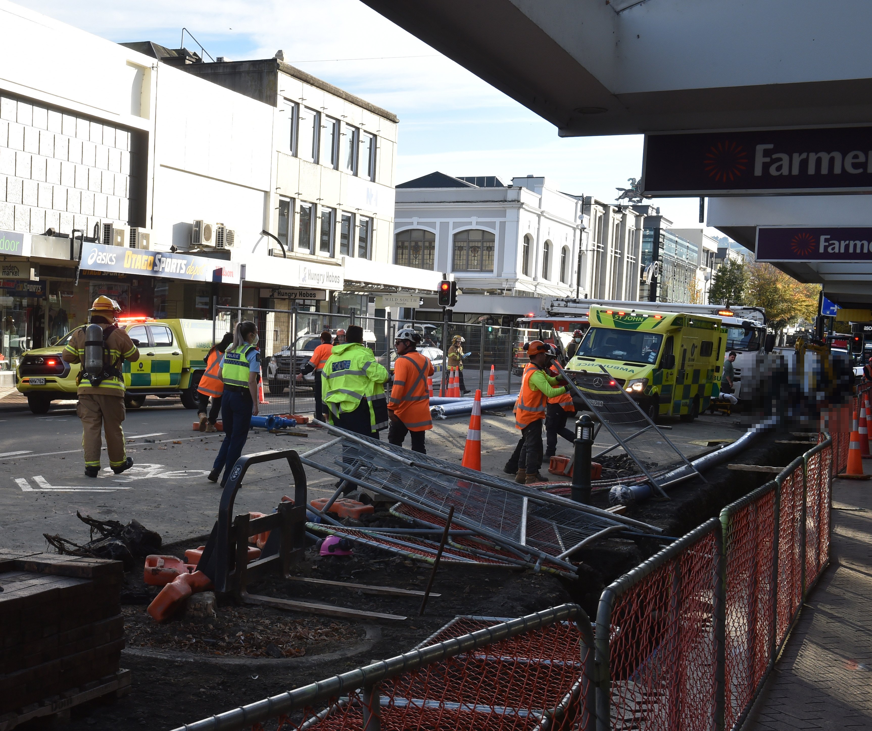 Emergency services at the scene outside Farmers department store this morning. PHOTO GREGOR...