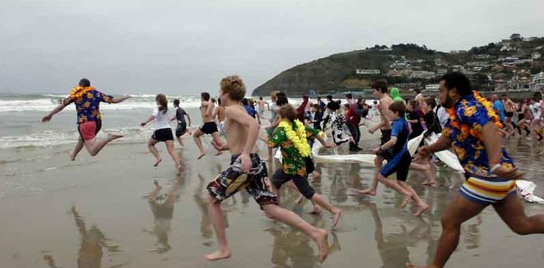 Participants head to the water in a previous polar plunge. File photo