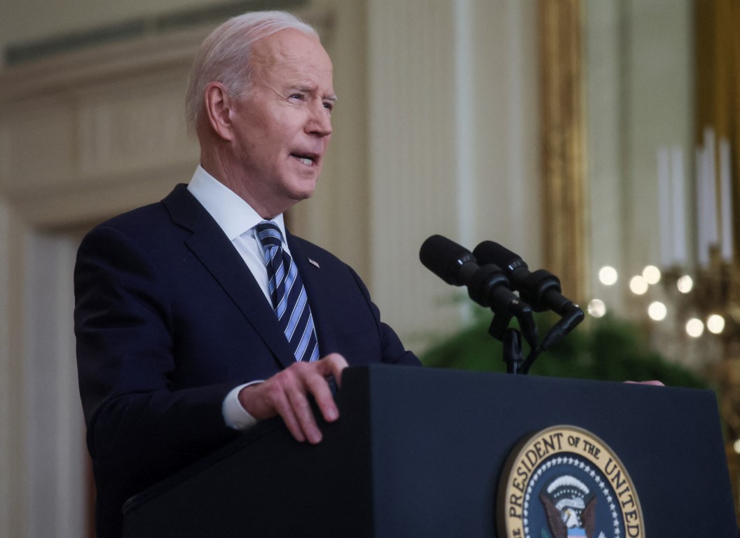 US President Joe Biden delivers remarks on Russia's attack on Ukraine, in the East Room of the...