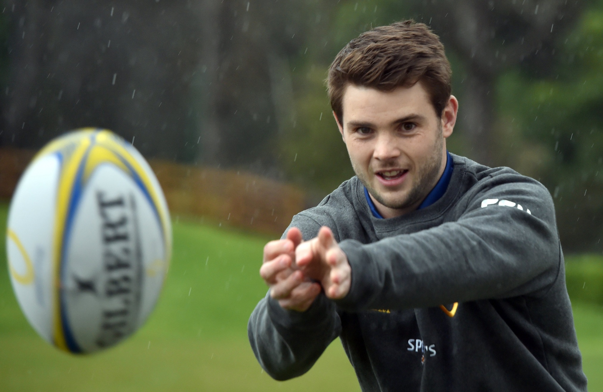 Rookie Otago halfback Kieran McClea snaps off a pass at his club home ground the University Oval...