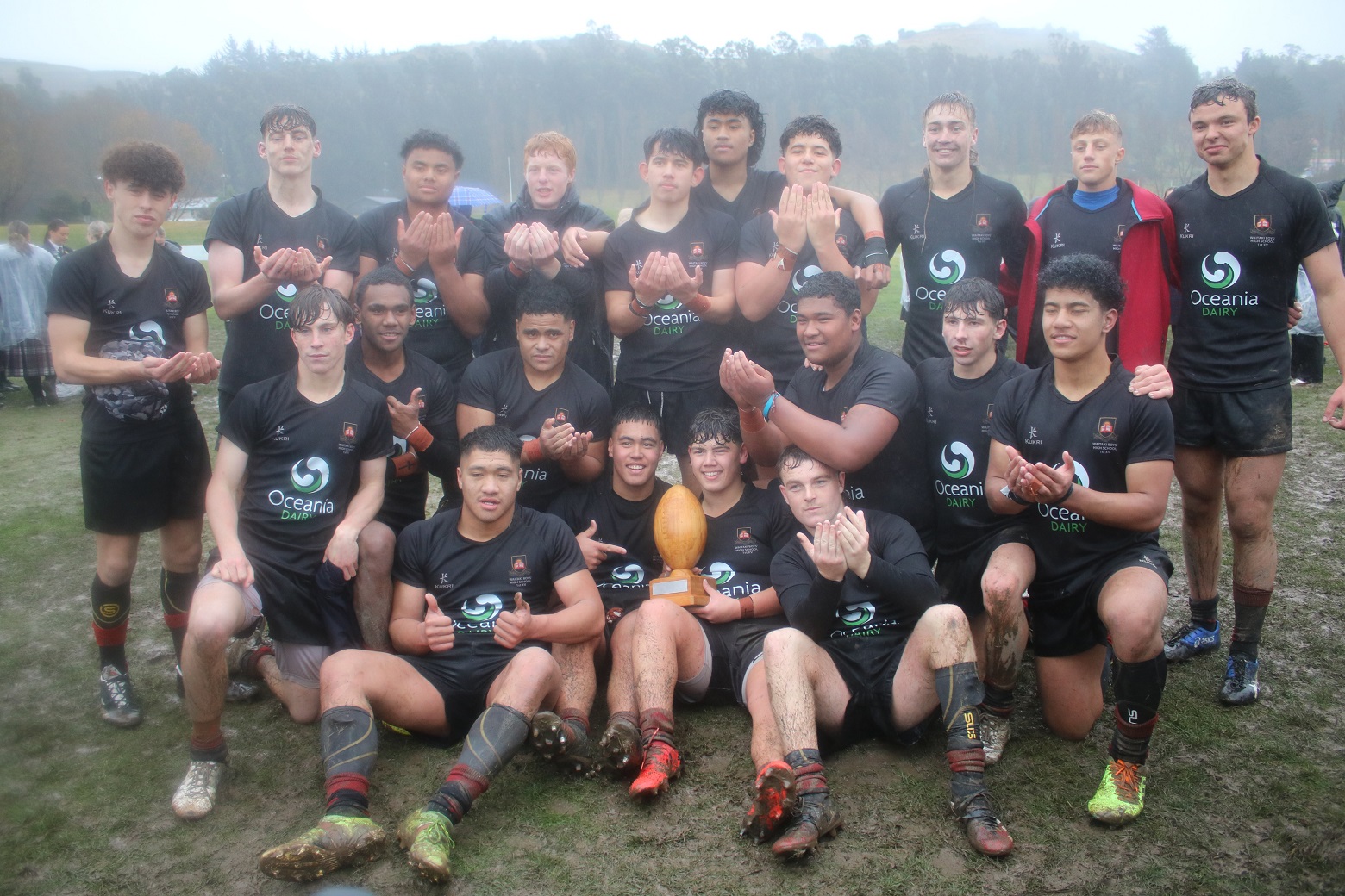 Waitaki Boys’ High School celebrates its 12-5 win over St Kevin’s College in yesterday’s...