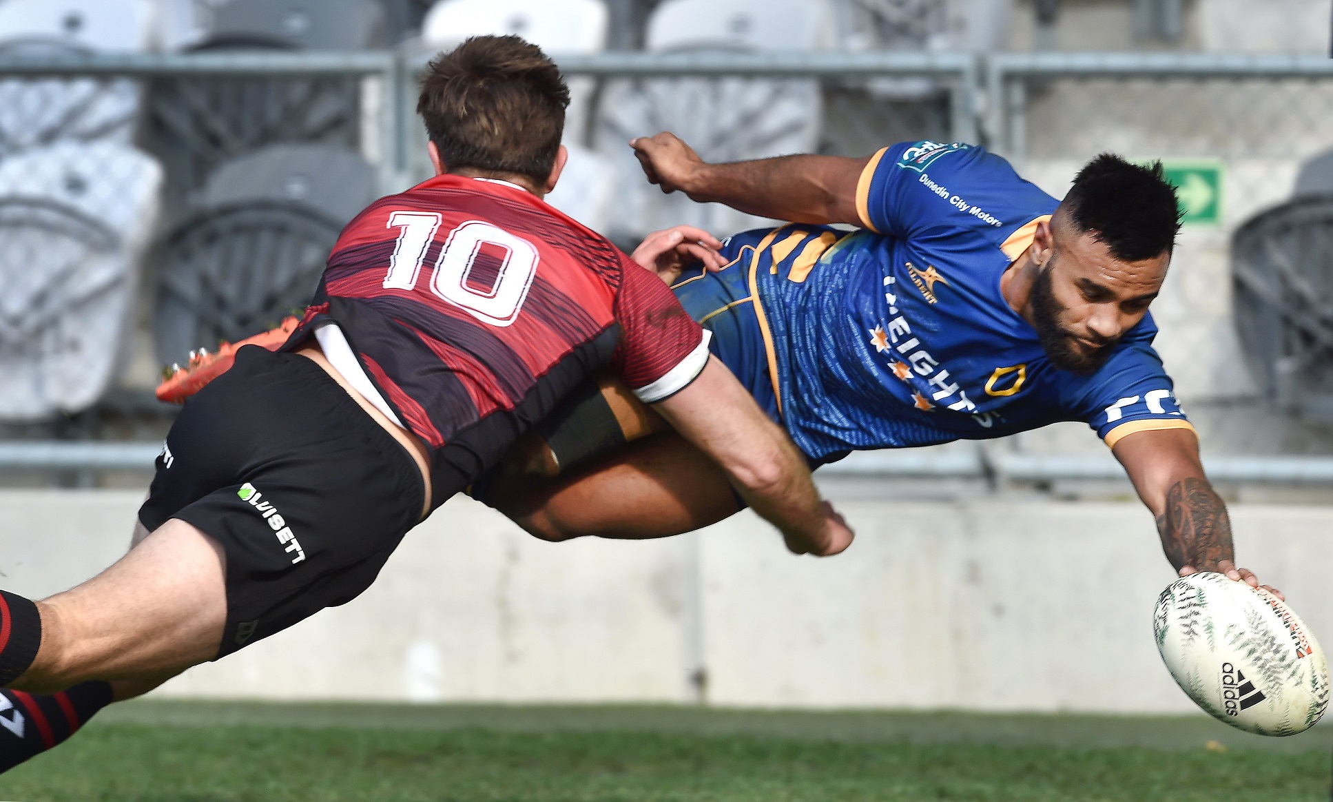 Otago winger Jona Nareki dives for the corner during a pre-season game against Canterbury at...