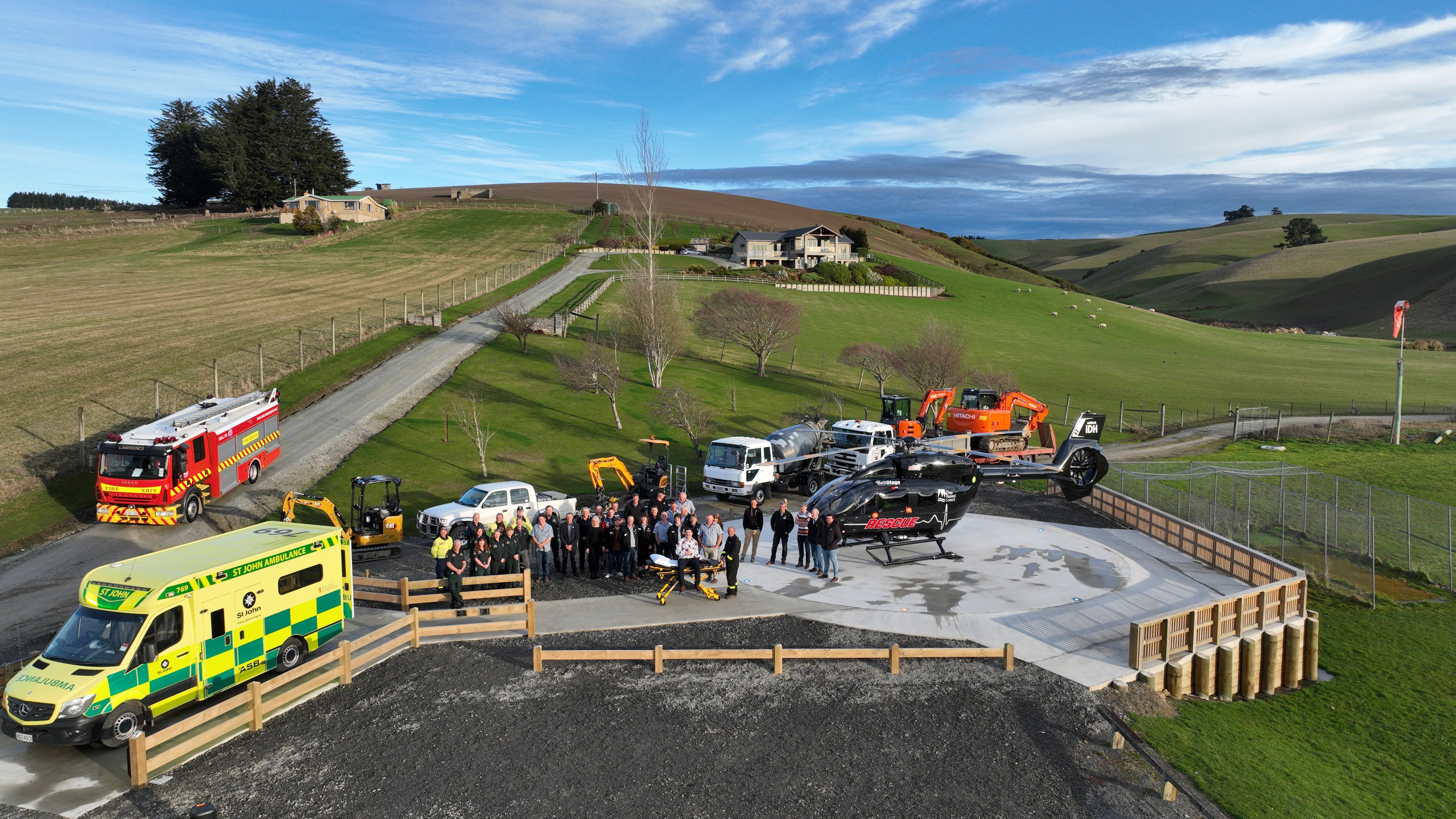 Project leaders and emergency service personnel welcome the Otago Regional Rescue Helicopter to...