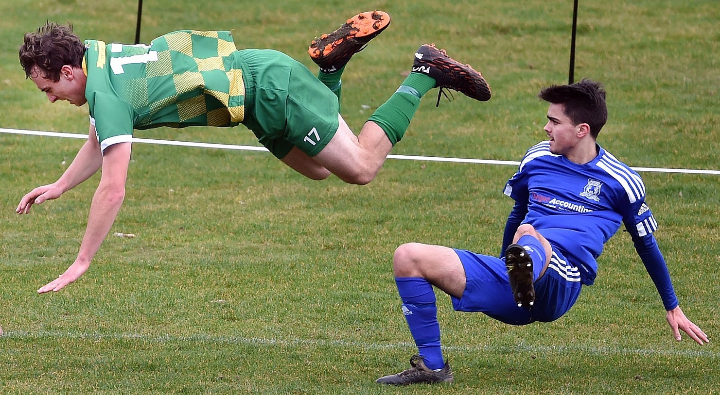 Green Island’s Jack Kelly flies over over the top of Mosgiel’s Isaac Hamilton during a Southern...