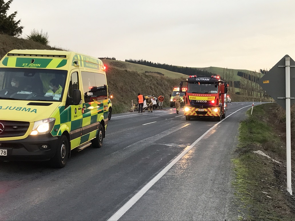 Emergency services at the scene near Waihola this afternoon. Photo: Linda Robertson