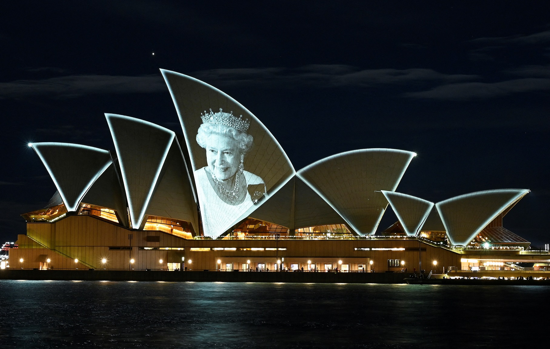 An image of Queen Elizabeth II is illuminated on the sail of the Sydney Opera House on Friday....