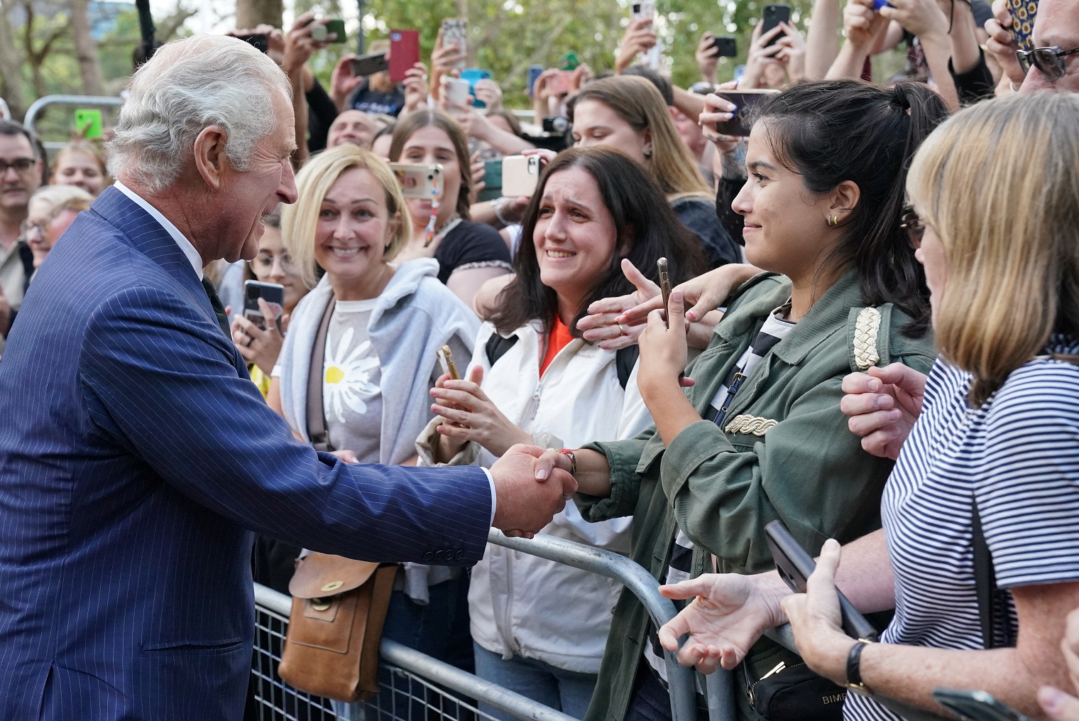 King Charles meets well-wishers as he returns to Clarence House from Buckingham Palace. Photo:...