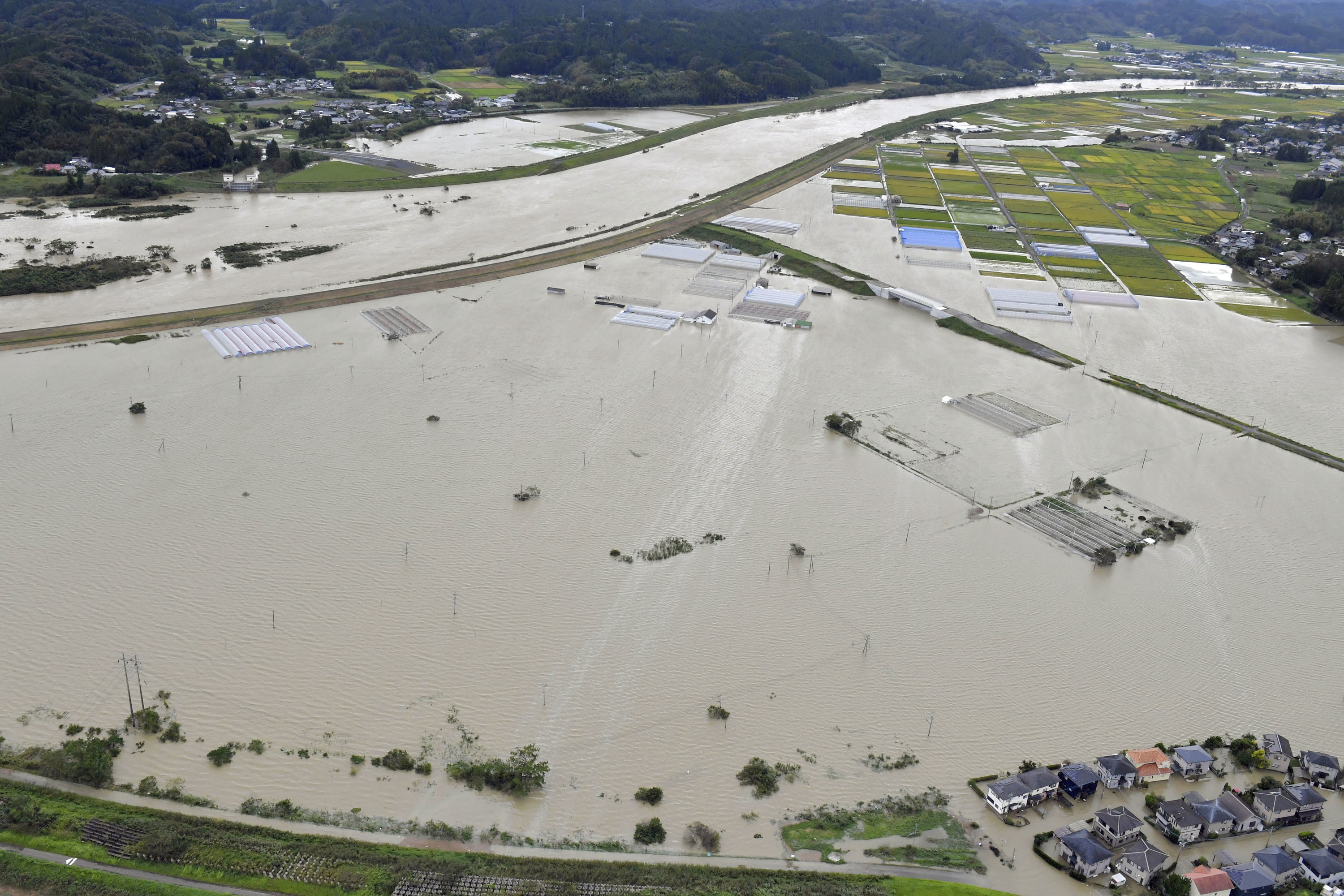 Submerged houses at a flooded area in Kunitomi, Miyazaki Prefecture, on the island of Kyushu....