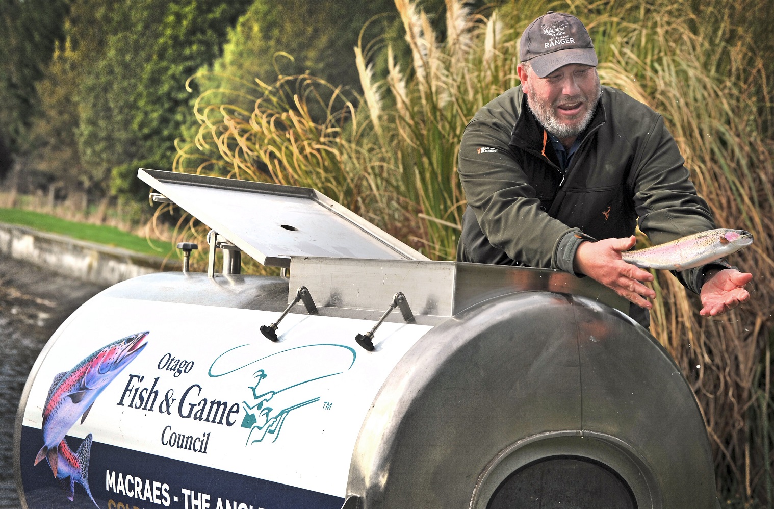 Otago Fish & Game officer Steve Dixon says his newly acquired stainless-steel fish transporter...