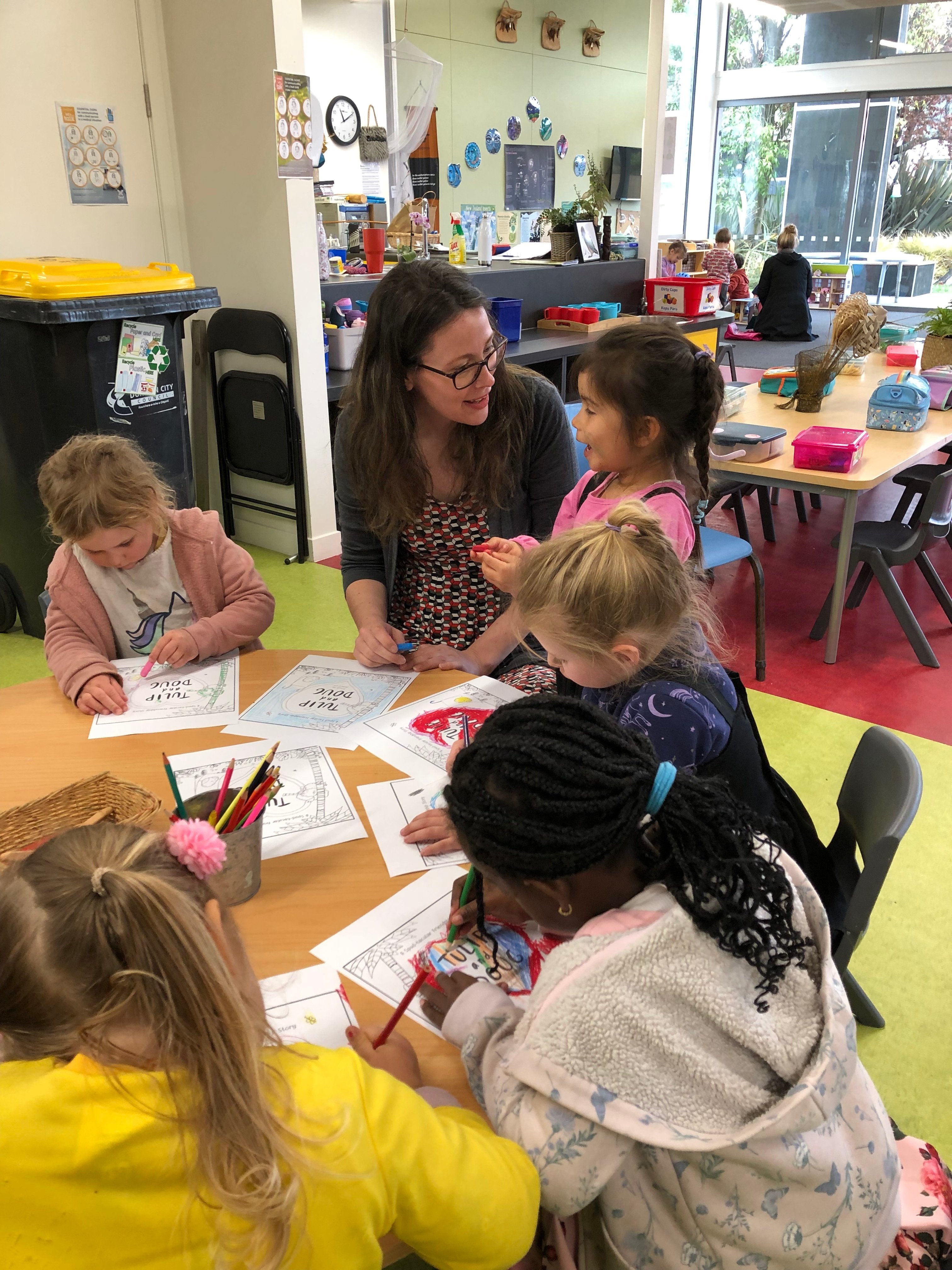 Enjoyment . . . Children enjoy working on crafts with visiting author Emma Wood. PHOTO: SUPPLIED