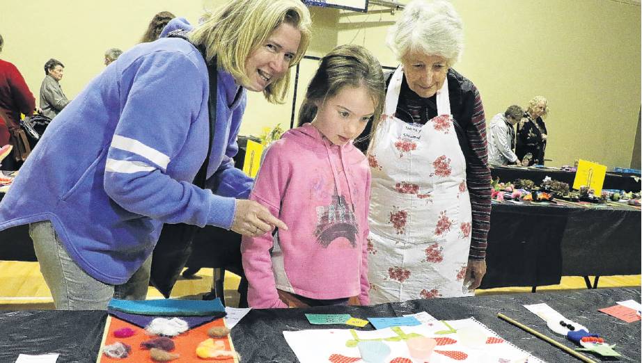 Second place . . . Joselyn Styles 7, accompanied by her mother Stephanie Styles (left) and her...