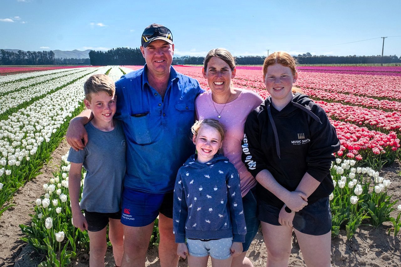 Blair and Jody Drysdale, from Balfour, with their children Fletcher, Leah and Carly in a field of...