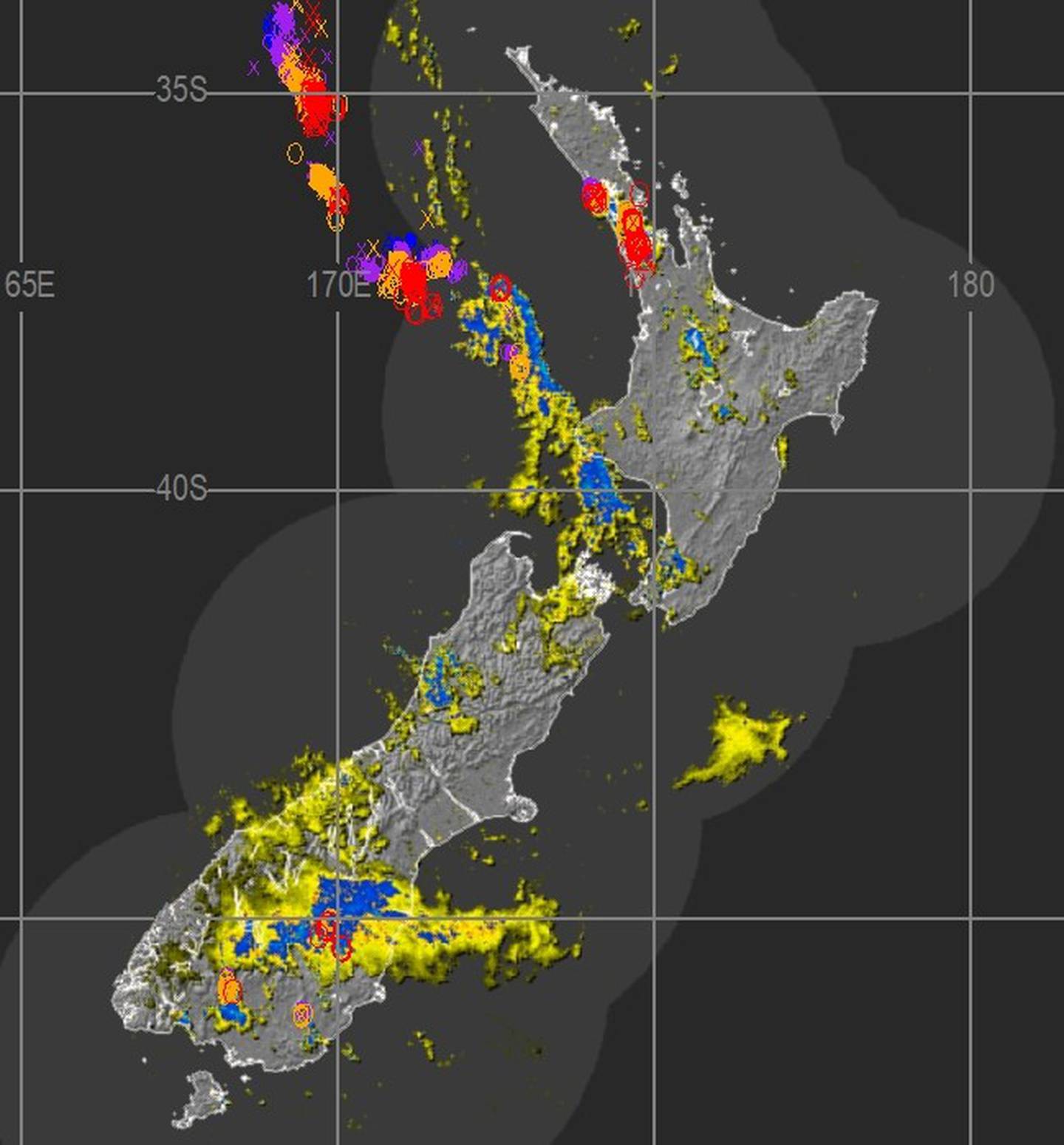 A rain radar image from Metservice showing lightning strikes over Auckland.