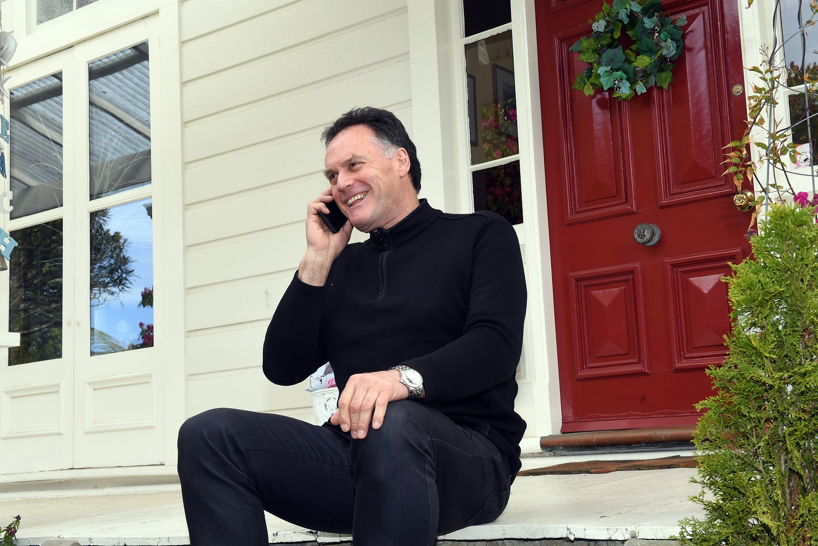 Accepting a congratulatory phone call on Saturday is Dunedin mayor-elect Jules Radich. Photo:...