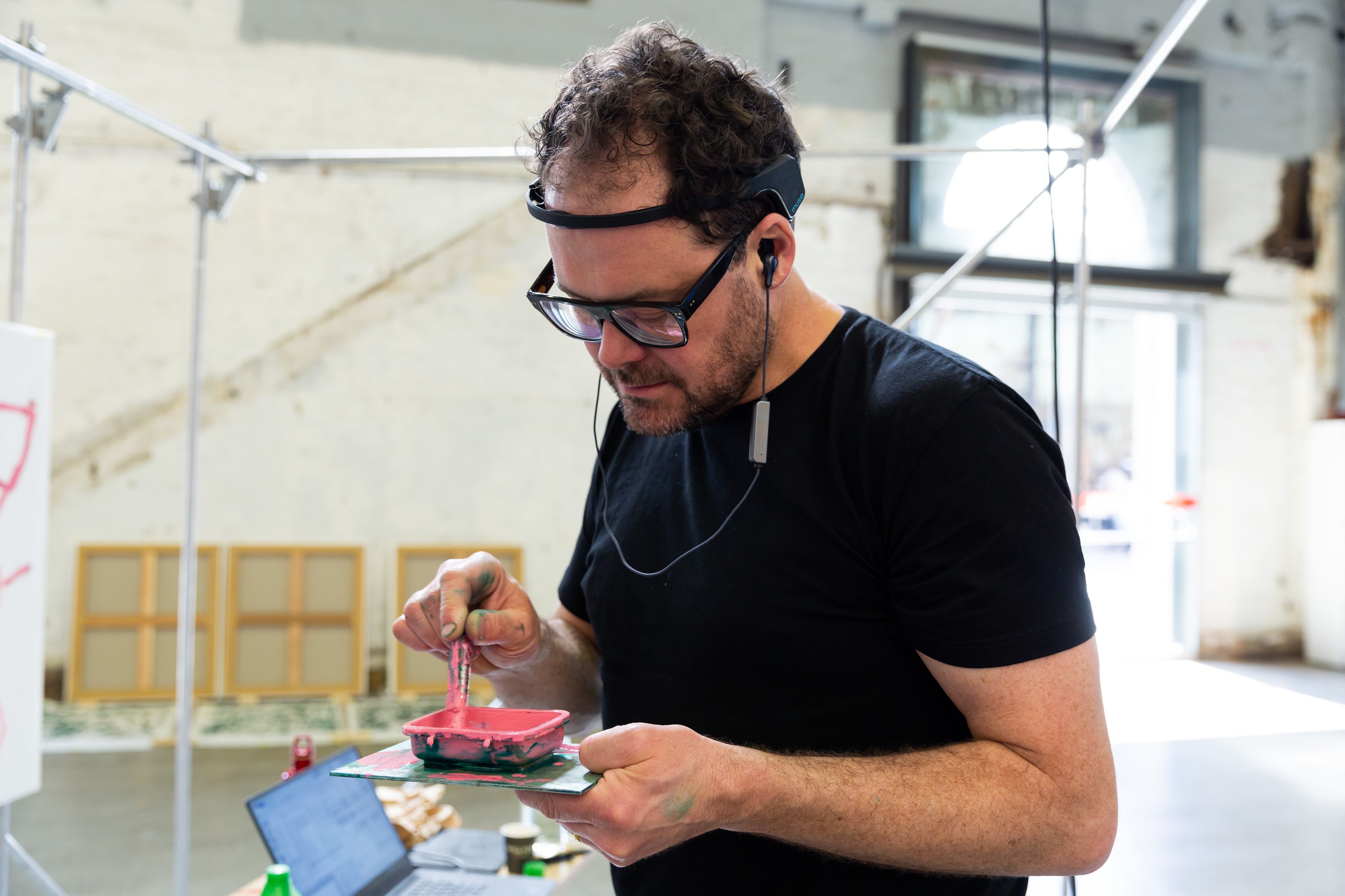 Artist Simon Ingram readies his painting machine.