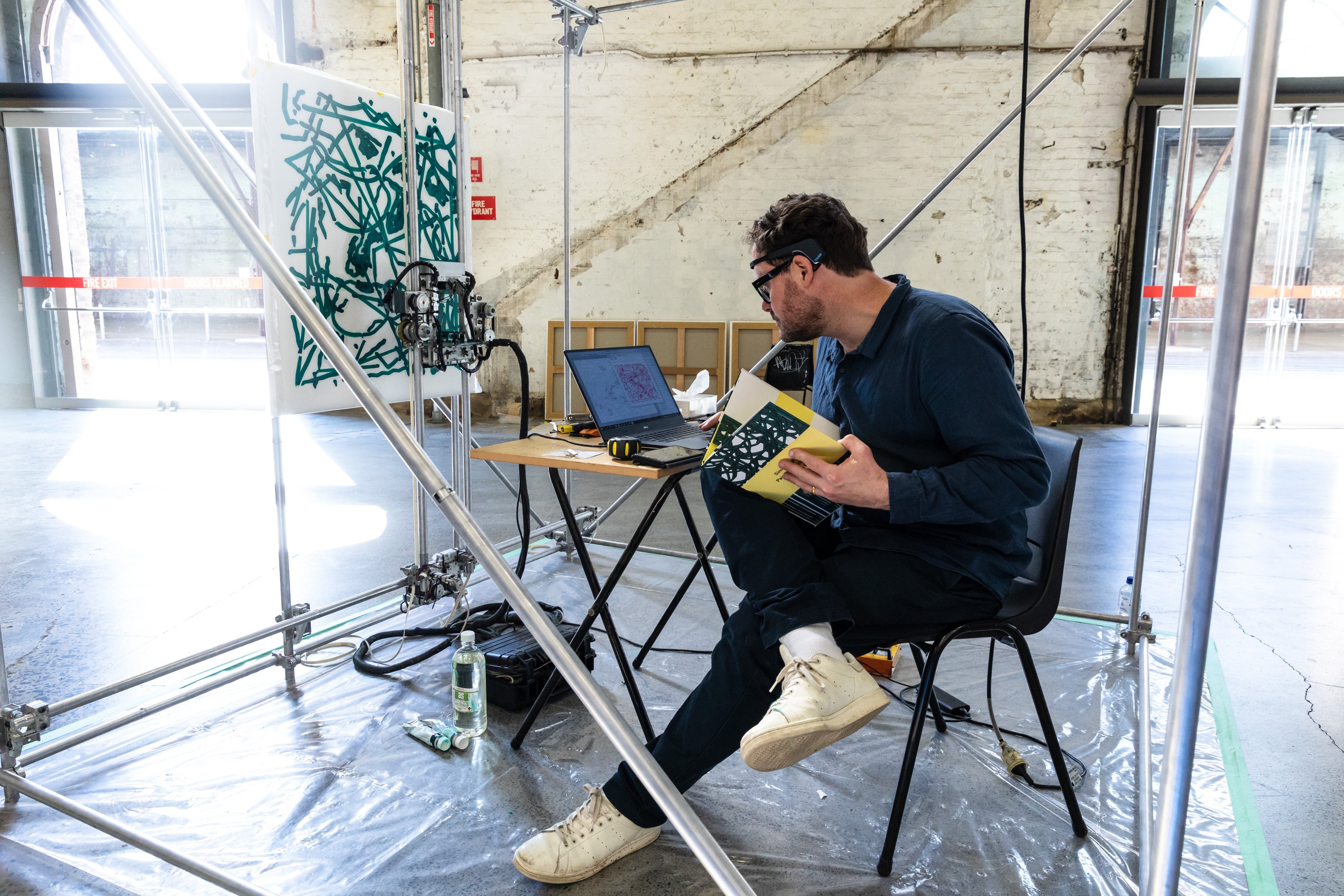 Simon Ingram tests out his brain-driven painting device which will be driven in Dunedin by the...