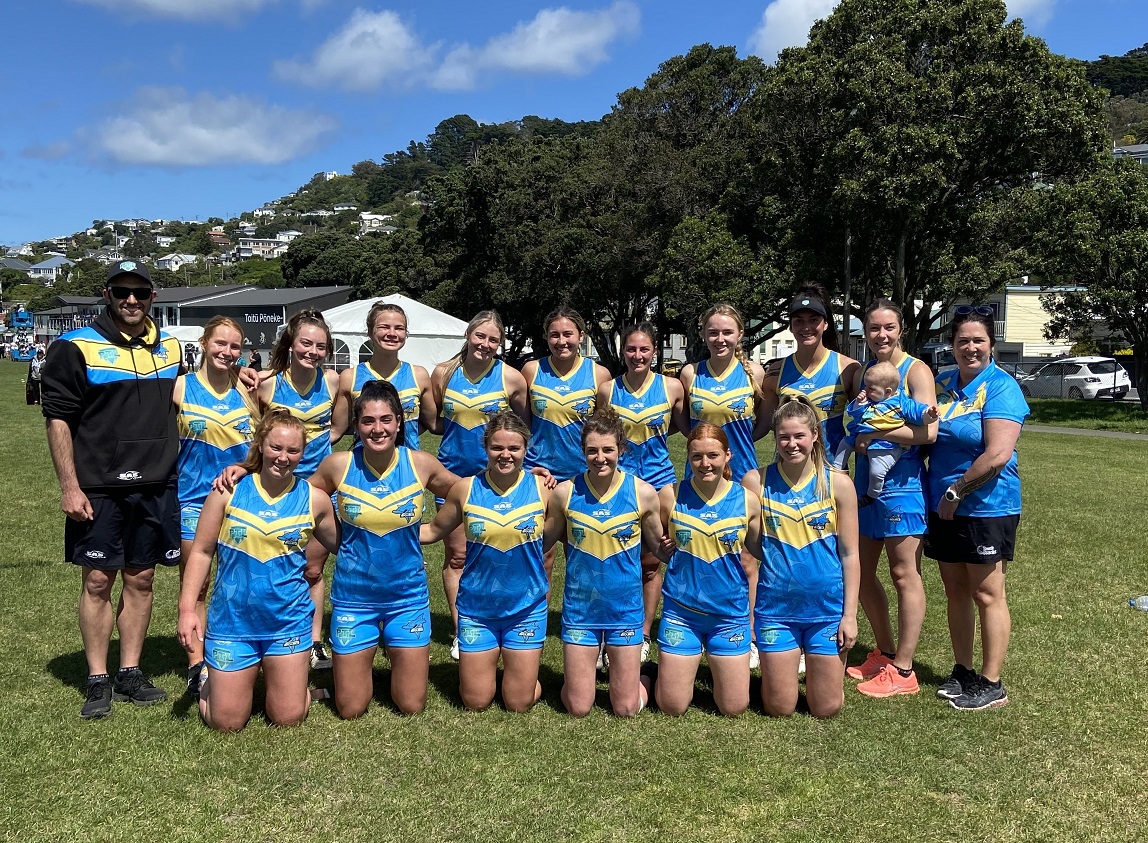 Southern Sharks players and coaches celebrate their dominant performance in the first round of...