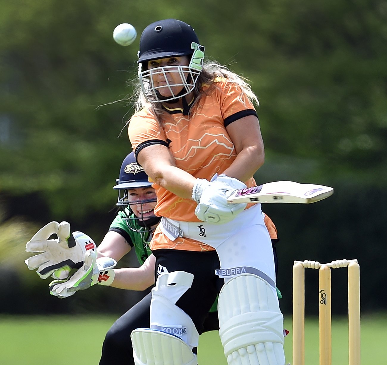 Angelique Barnes swats the ball during a Female Premier League game at the Kensington Oval on...