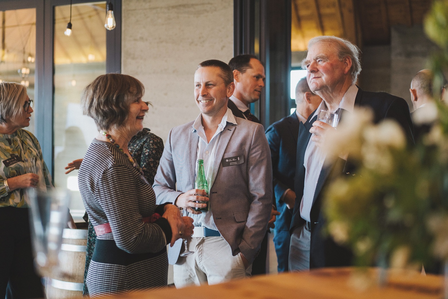 Merino growers Juliet and Ron Jones, from Matarae Station, chat with Joe Cameron (centre), from...