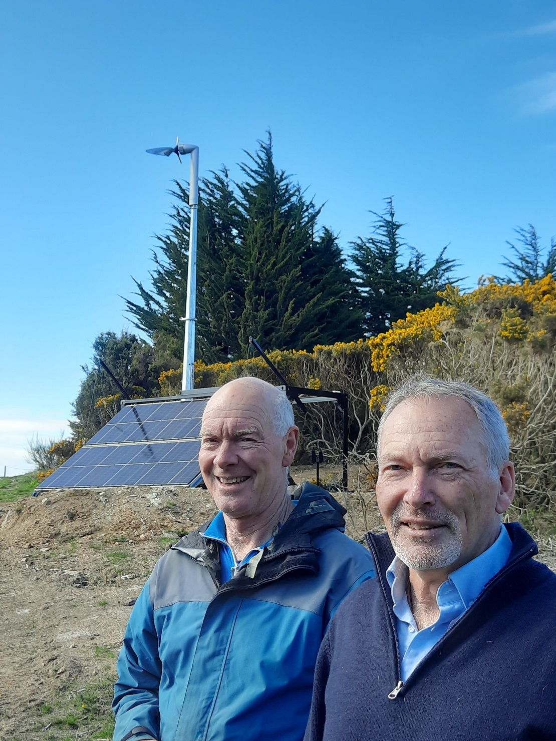 At the PowerCrate test site are (from left) Bill Currie and Tim Mepham from Powerhouse Wind....