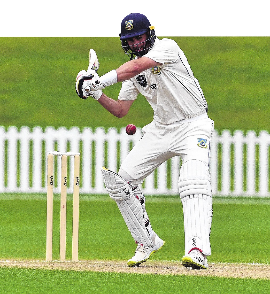 Otago seamer Travis Muller launches into a cut shot during a Plunket Shield game against Northern...