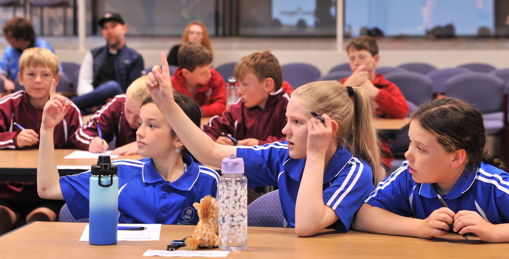 Lia Cliff (9, front left), Holly Watkins (10), and Ella Jones (9) of Kaikorai Primary School have...