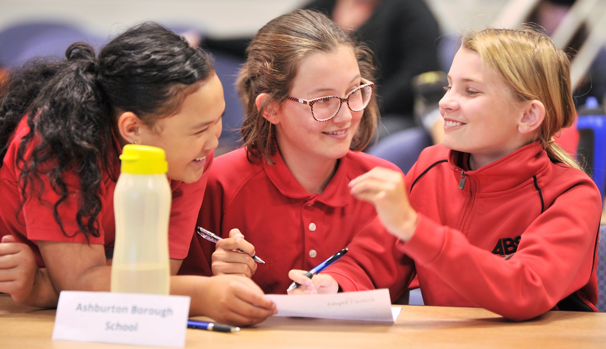 Kikisi Riro (11), Harriet Reed (11) and Florence Adamson (10), of Ashburton Borough School, enjoy...