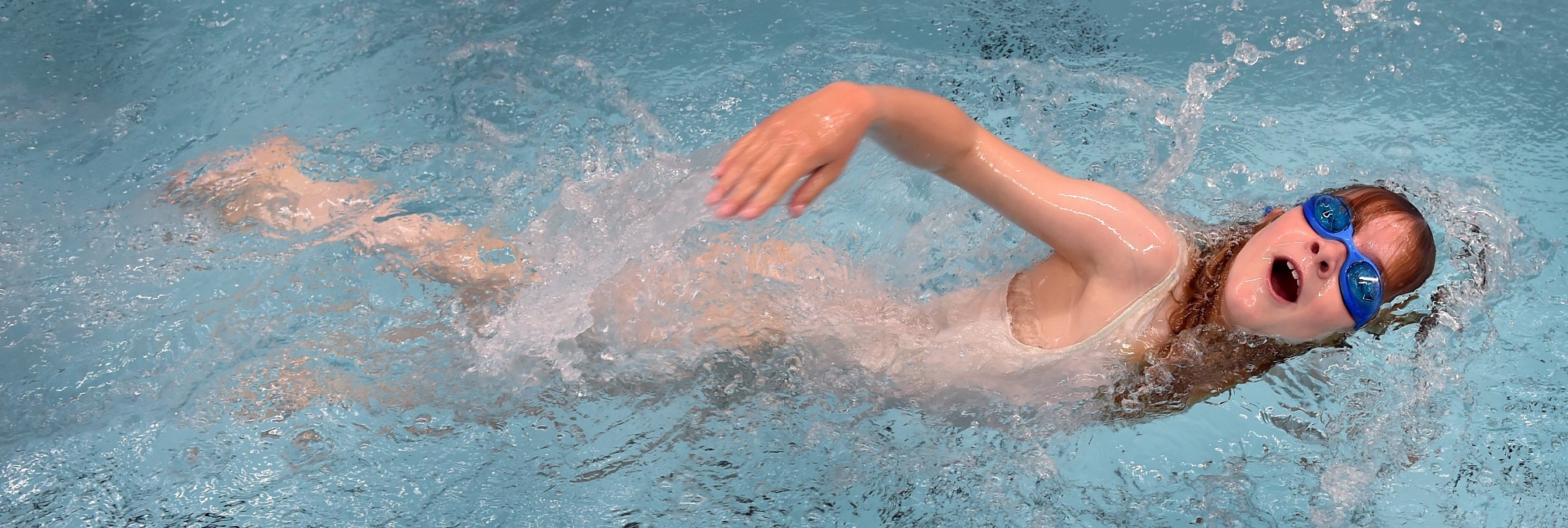 Dunedin’s Amber Sargent (8) swims into the current of the University of Otago flume in a family...