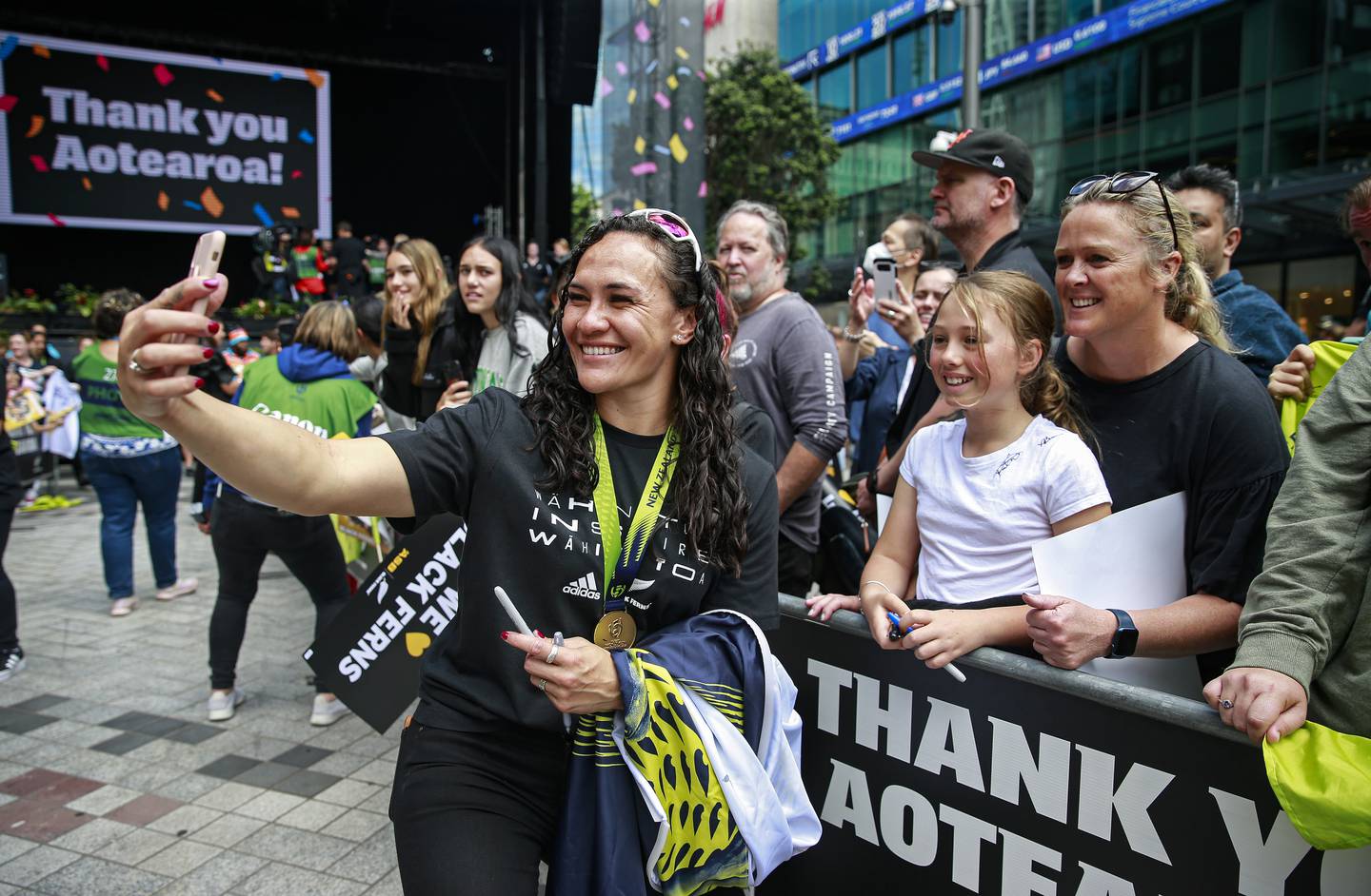 Portia Woodman takes selfies with the fans today at the Black Ferns celebration in downtown...