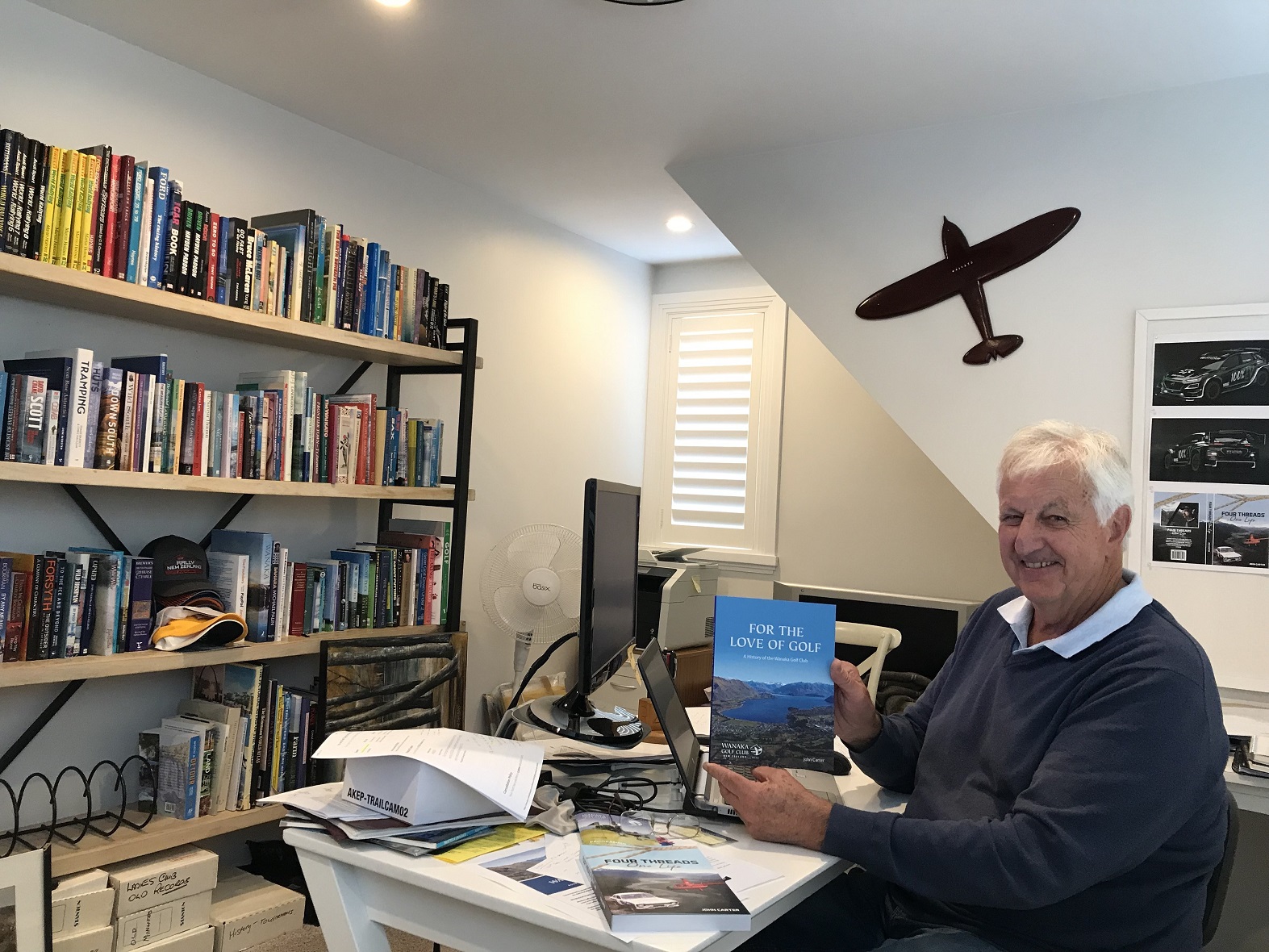 Wanaka writer John Carter with his books, For the Love of Golf, which will be launched today, and...