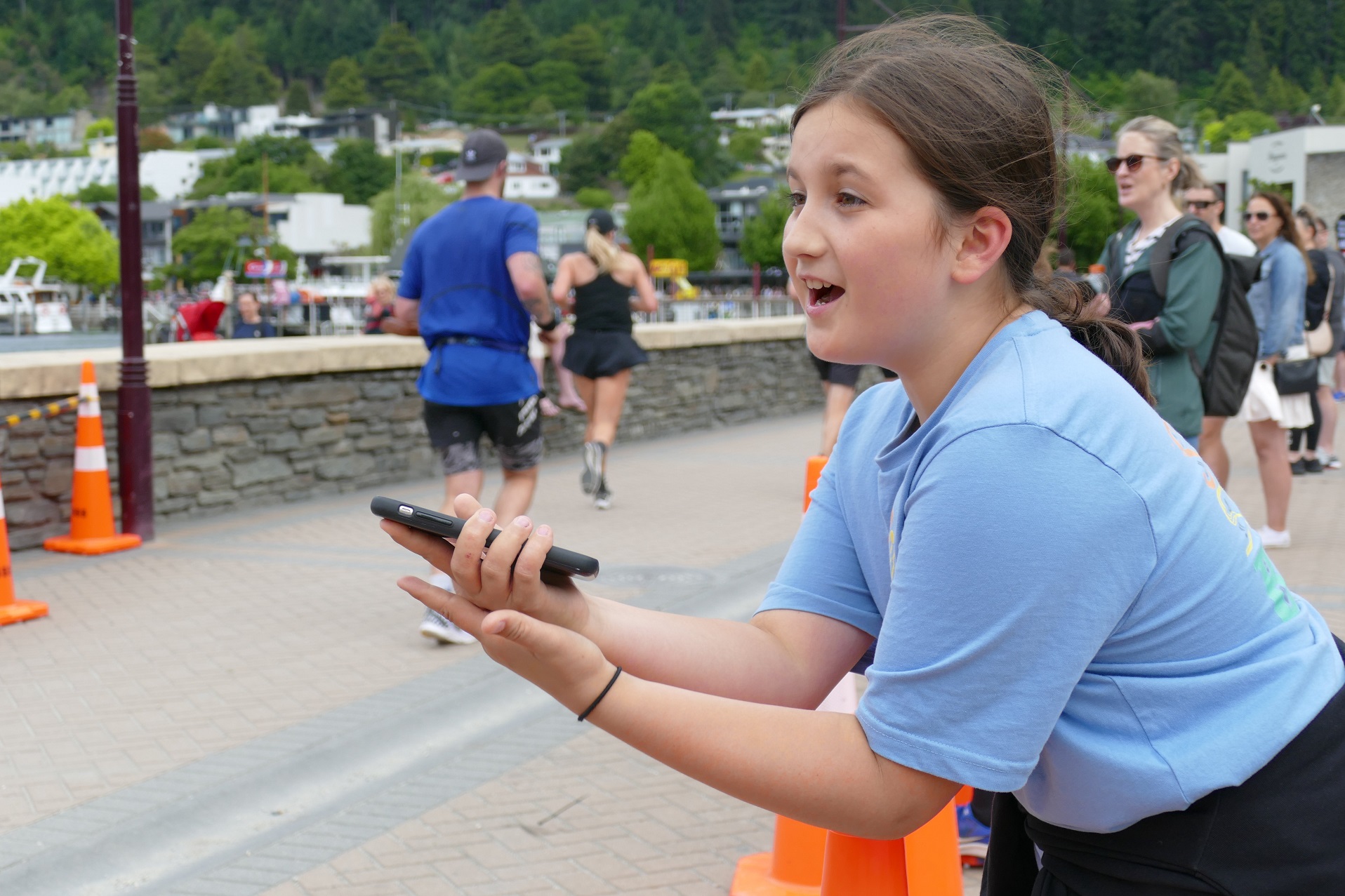 Lucy Landon-Lane (11), of Cashmere, yells encouragement at athletes. Photo: Tracey Roxburgh