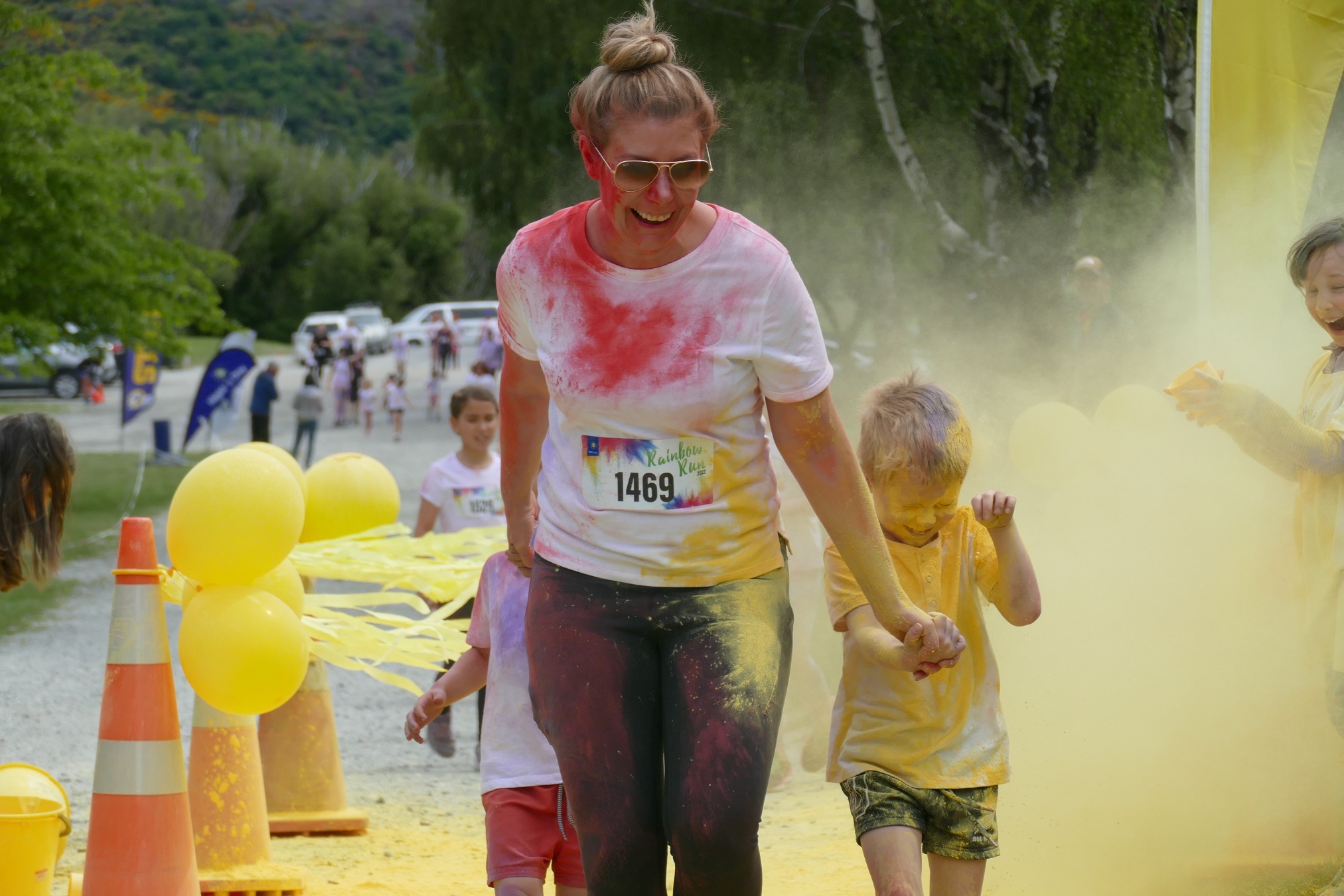 Queenstown’s Georgina Cunningham helps her son, Boston Dodds (5), through a colour station at...