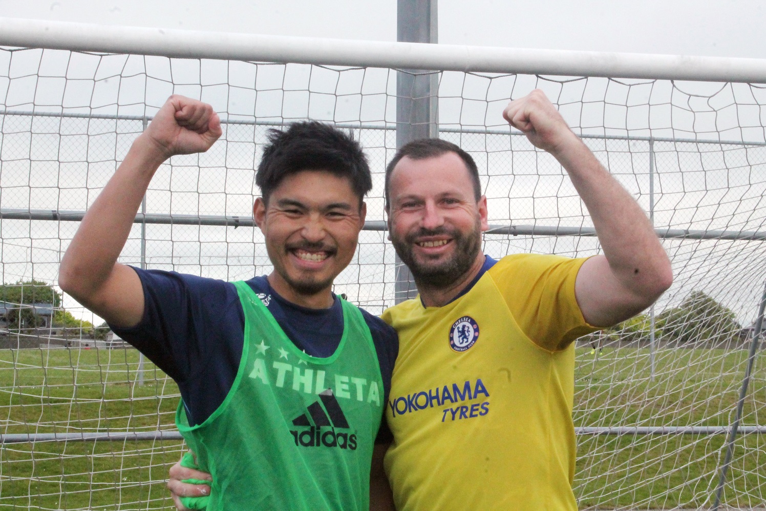 Japanese national Rio Okuyama and New Zealander Glenn Marshall, both from Invercargill, celebrate...