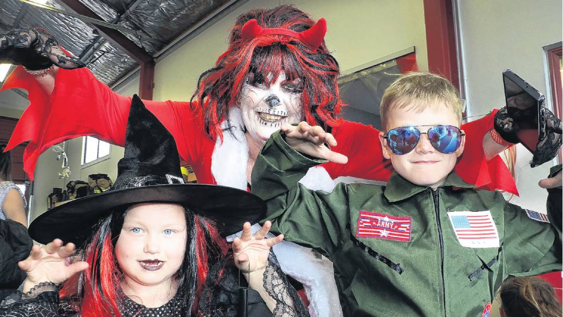 Halloween fun . . . While ghoulishly dressed operational support firefighter Sandra Grant looms...