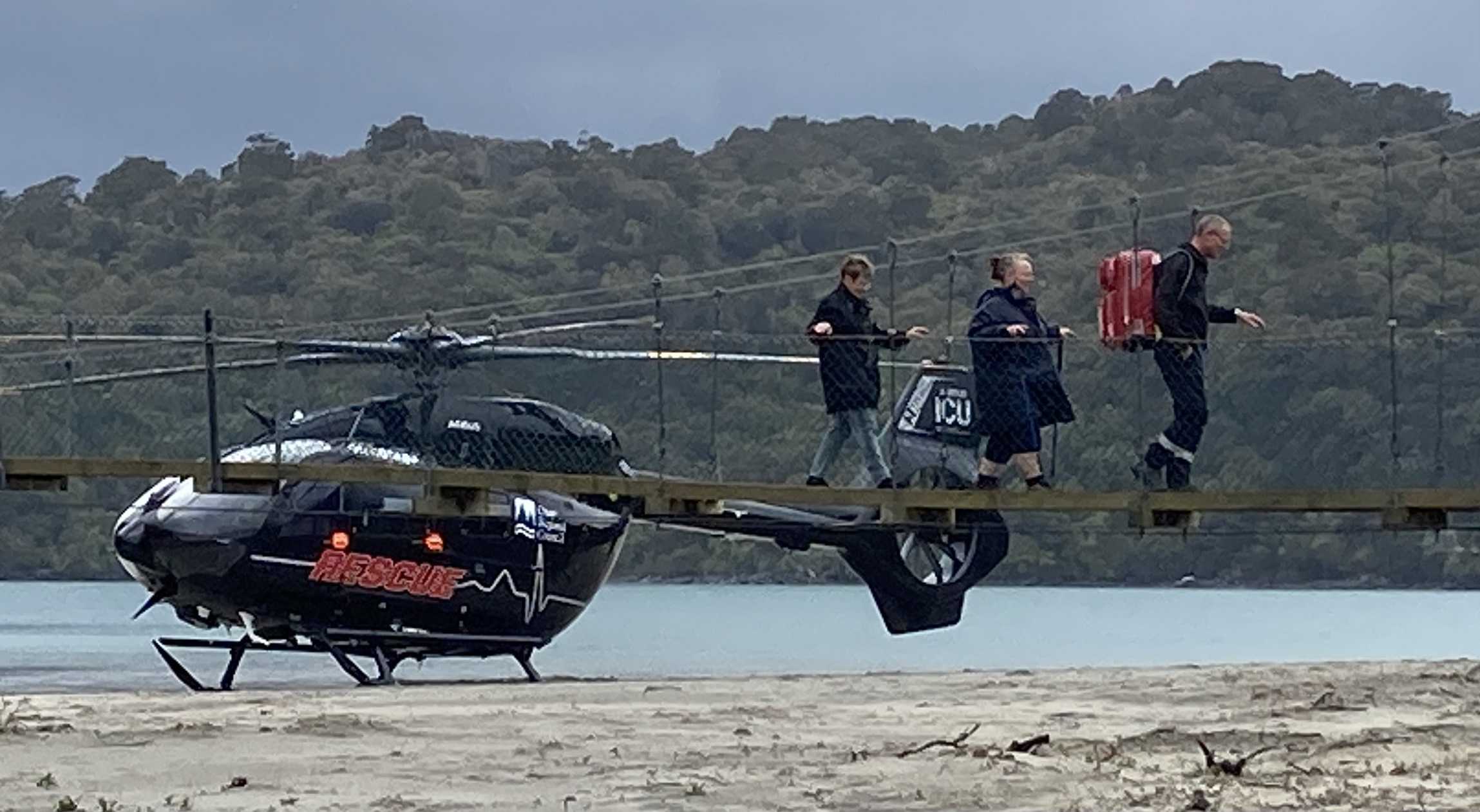 A tramper with an injured knee is airlifted from Māori Beach on Stewart Island today. Photo:...