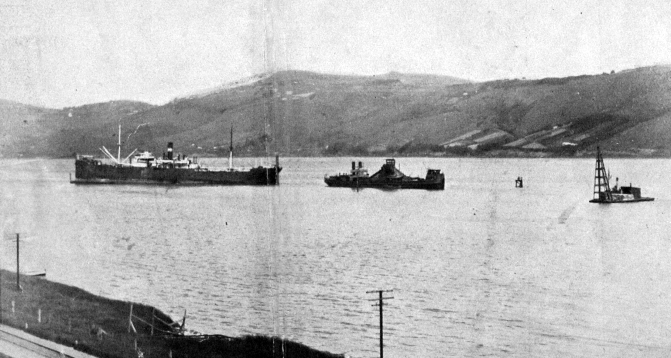 The Ellerman and Bucknall steamer Matoppo, aground on a mudbank at Ravensbourne, is attended by...