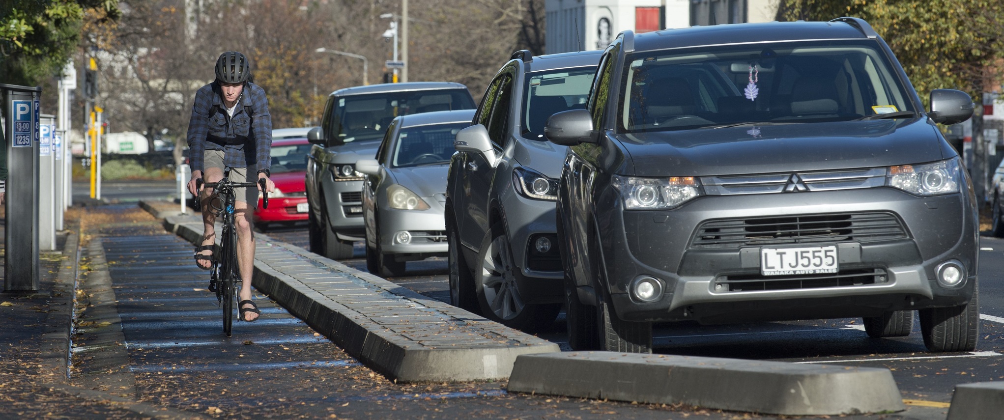 A cyclist passes parked cars in Great King St. Photo: ODT Files