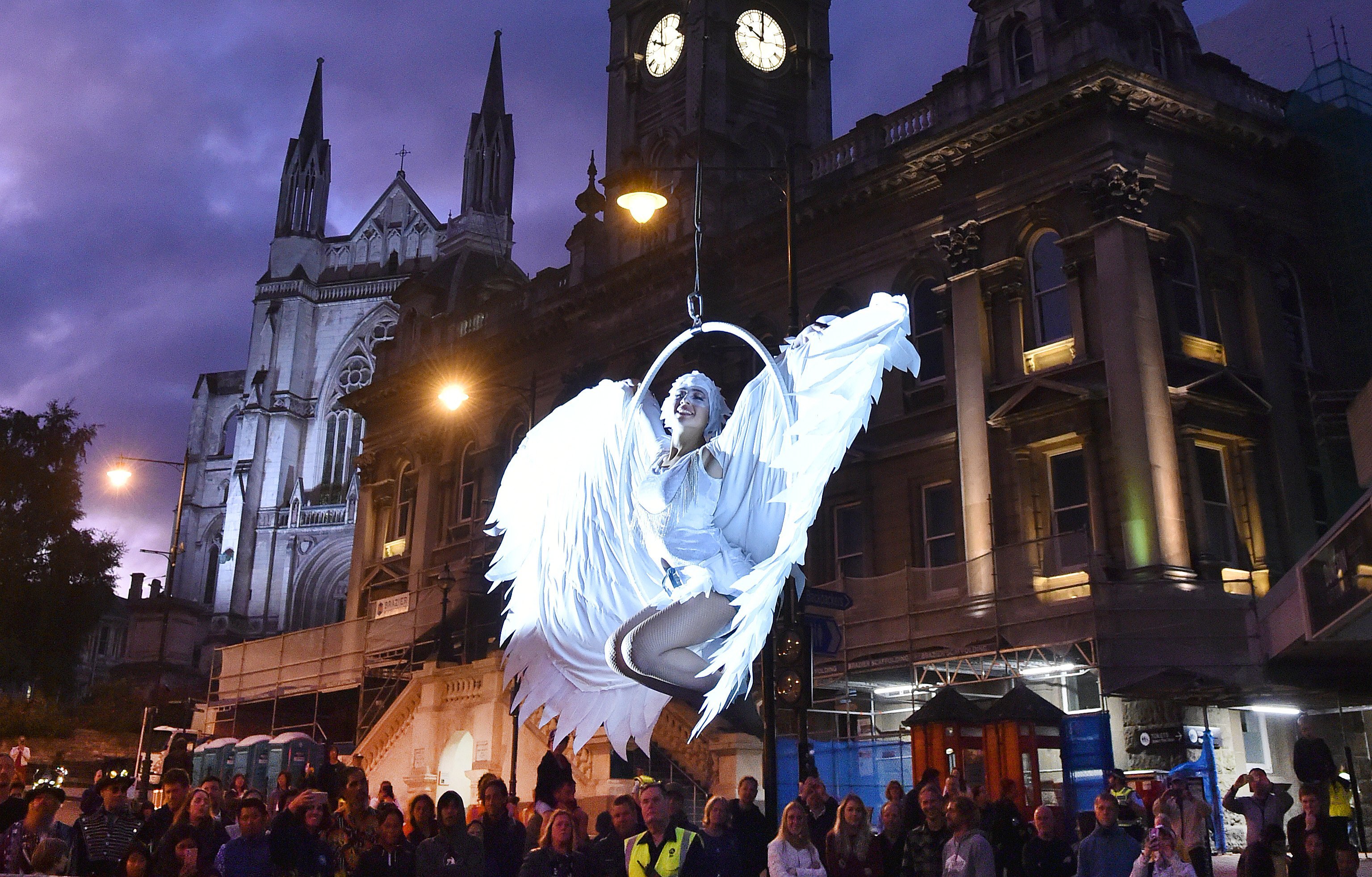 Aerialist Anna Brunt (15) takes to the skies with sparkling white wings before thousands of New...