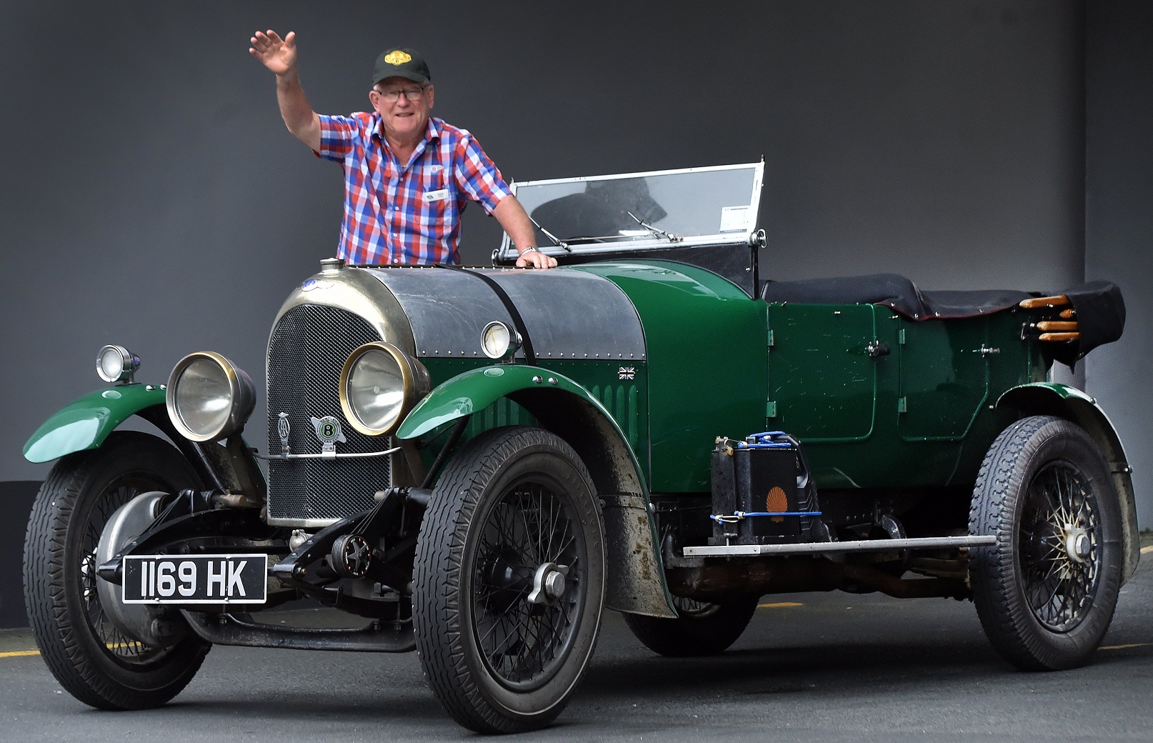 Cedric Cook stands proudly on the side of his 1924 three-litre Bentley in Dunedin yesterday....