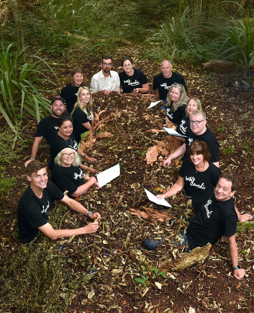 Wild Dunedin committee members celebrating the nature festival’s theme this year of soil and...