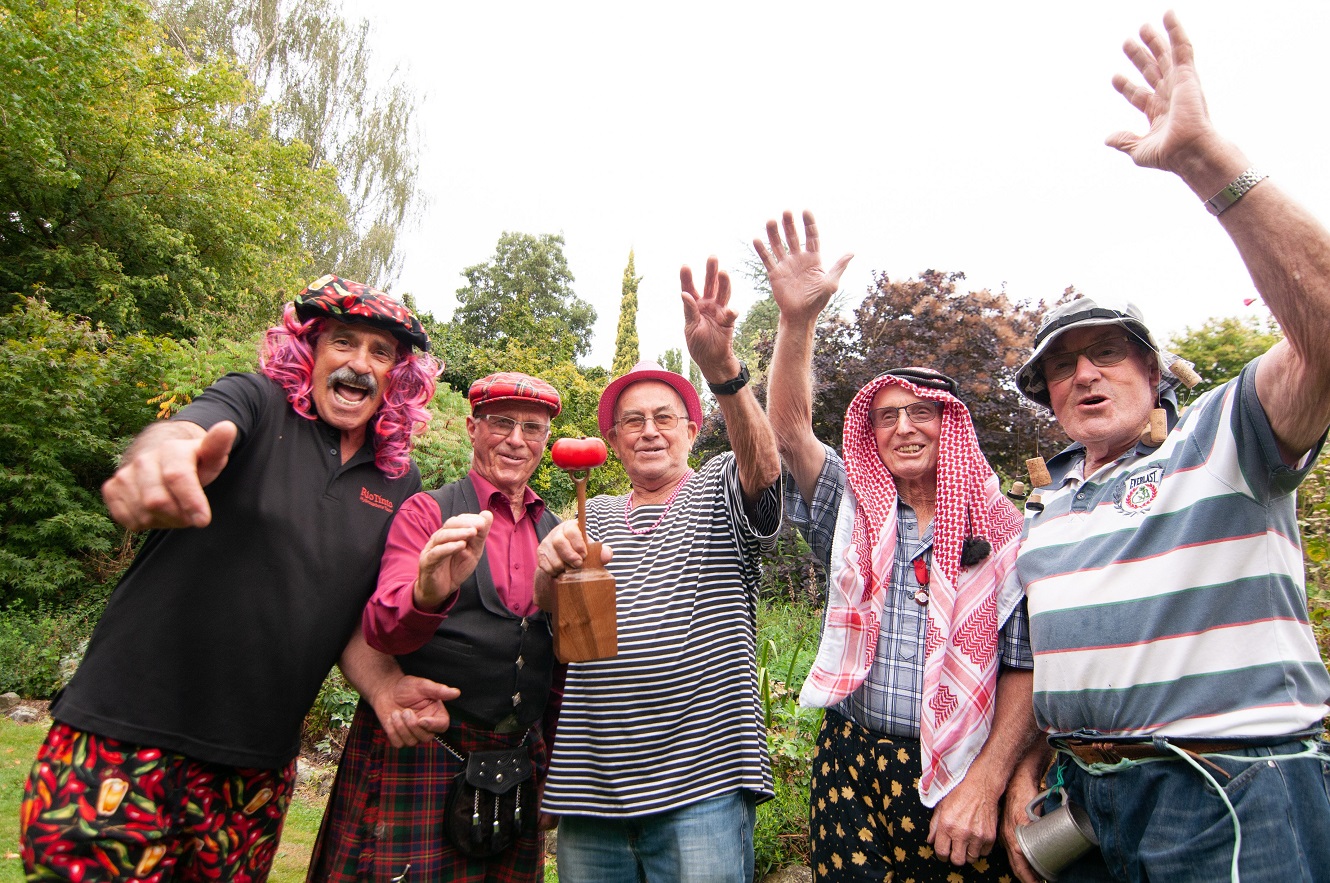 Friends and tomato-growing enthusiasts (from left) John Asher, Ken Bain, Tony Omand, judge Owen...