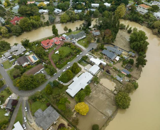 Homes and belongings inundated by mud and silt in Gisborne. Dunedin has adopted the East Coat...