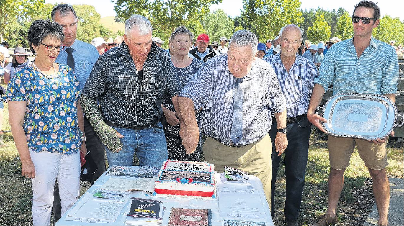 Cutting the cake . . . Laurie O’Carroll and Fred Fowler cutting the 125th anniversary cake in...